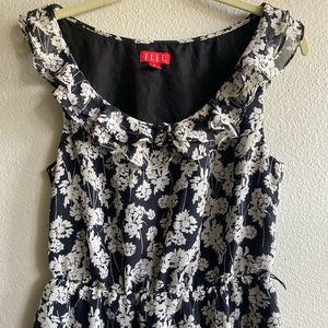 Elle black and white daisy print top